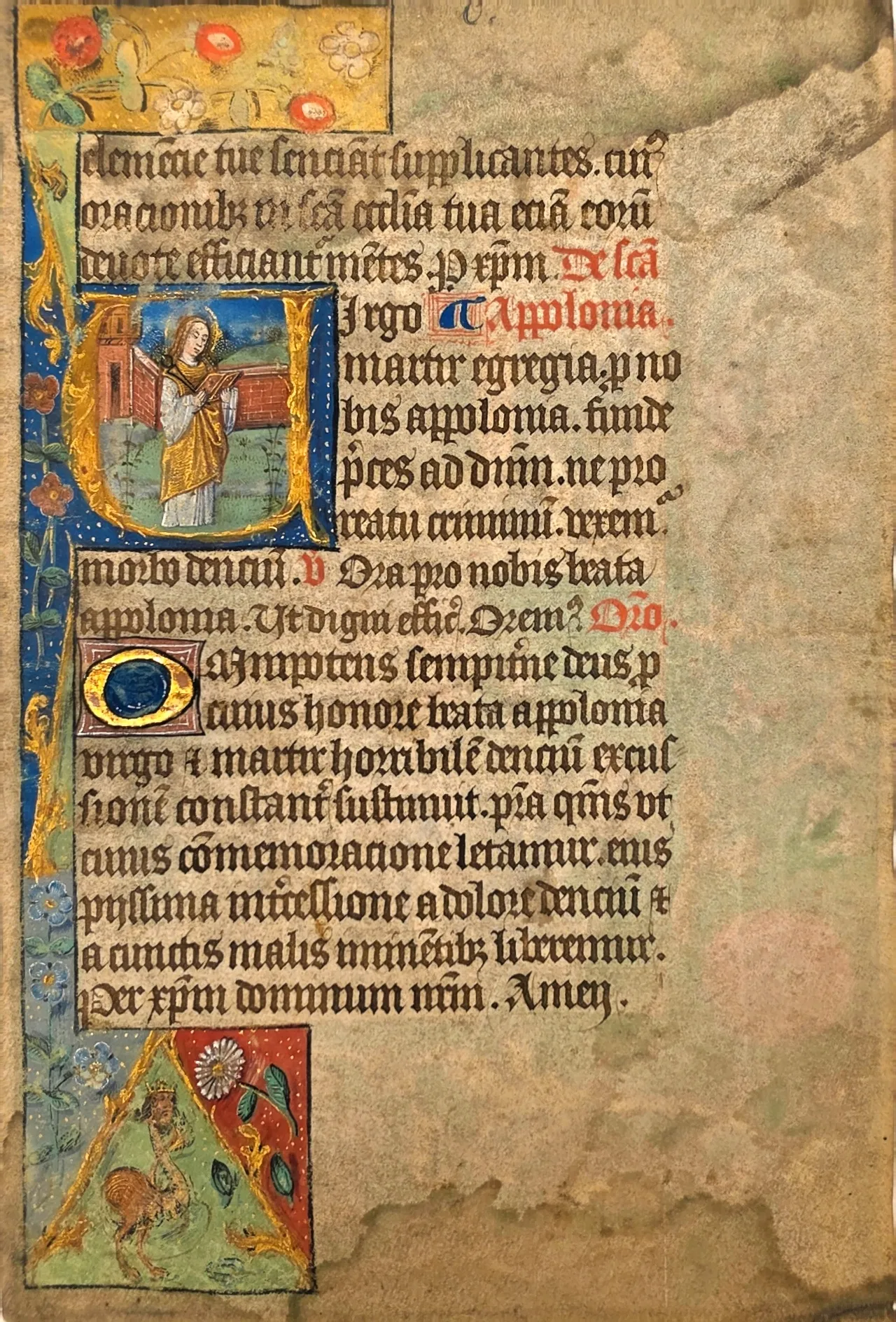 Bild av Sankt Apollonia inom det initiala "V" i bönen Virgin Apollonia. Pergamentbreviarium, Flandern, ca 1500.