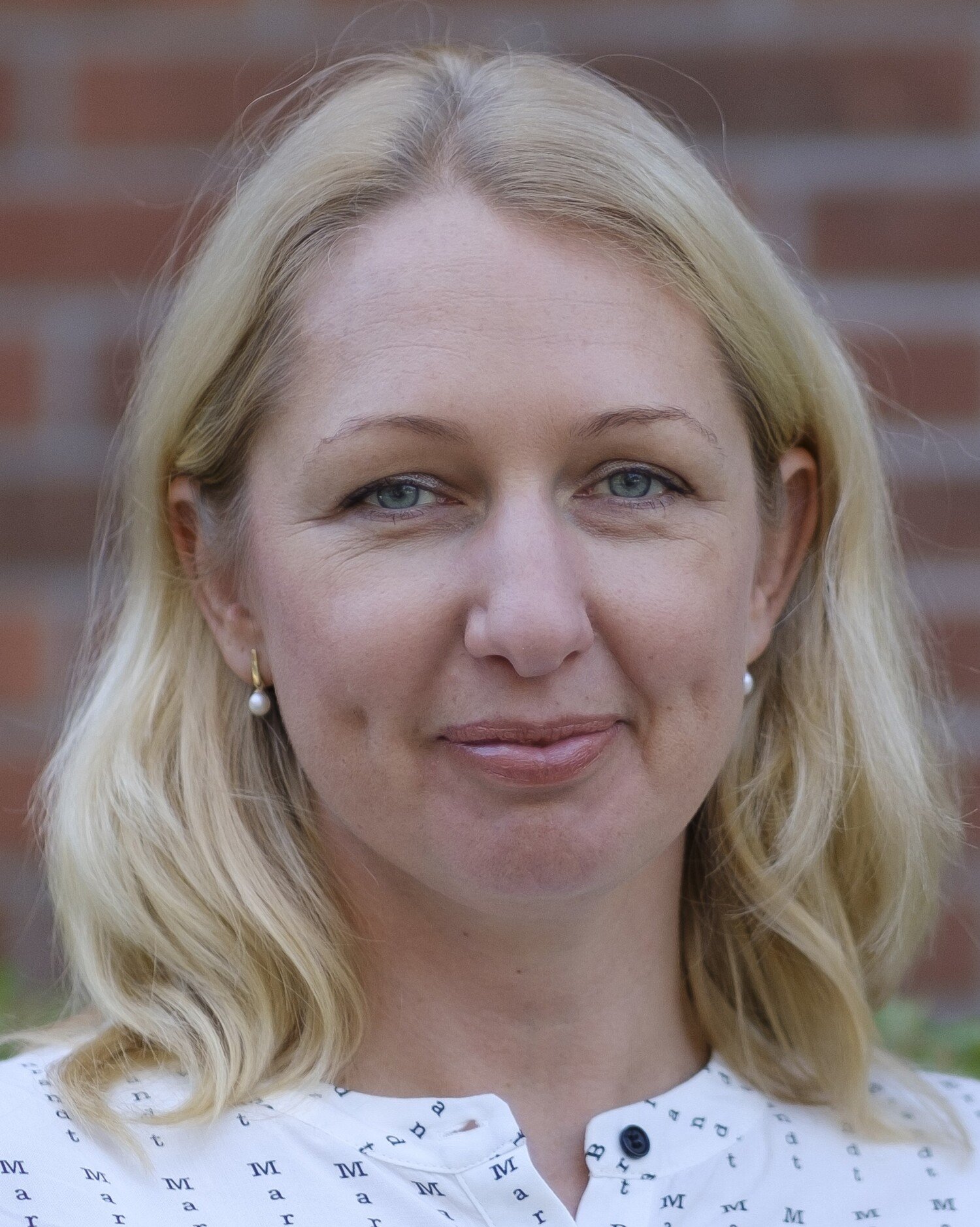 Bild på en blond kvinna Docent Karin Modig