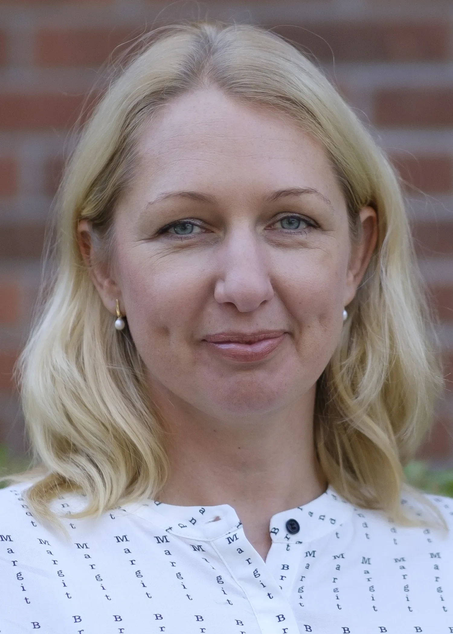 Bild på en blond kvinna Docent Karin Modig