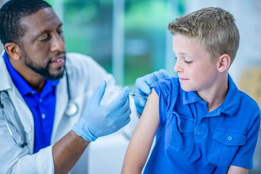 A boy getting a vaccine