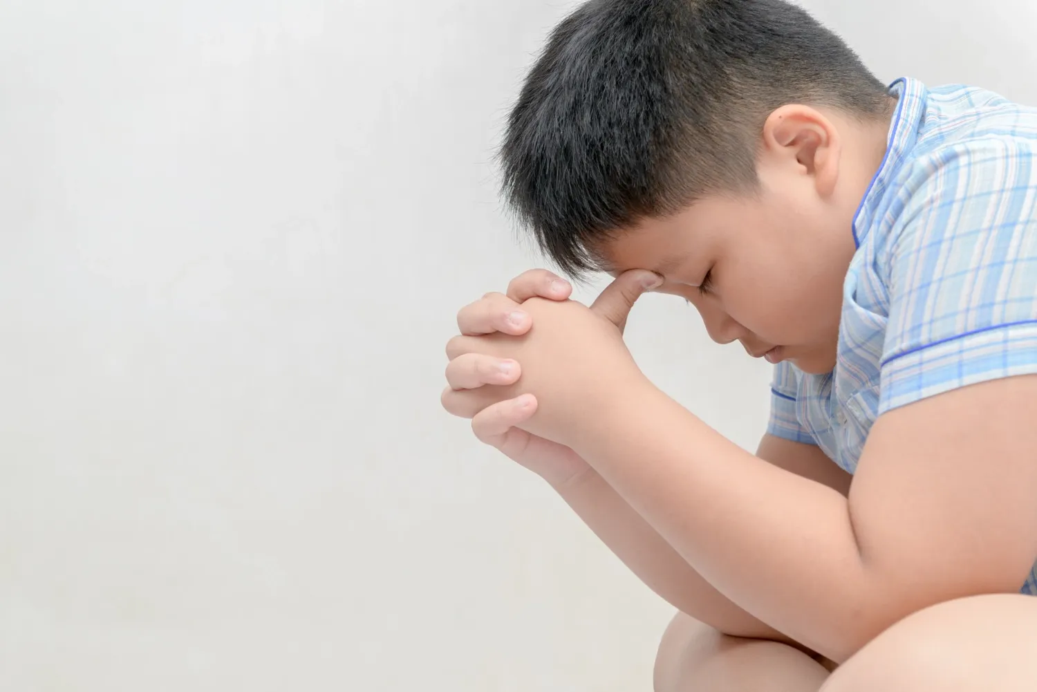 Photo of child on a scale.