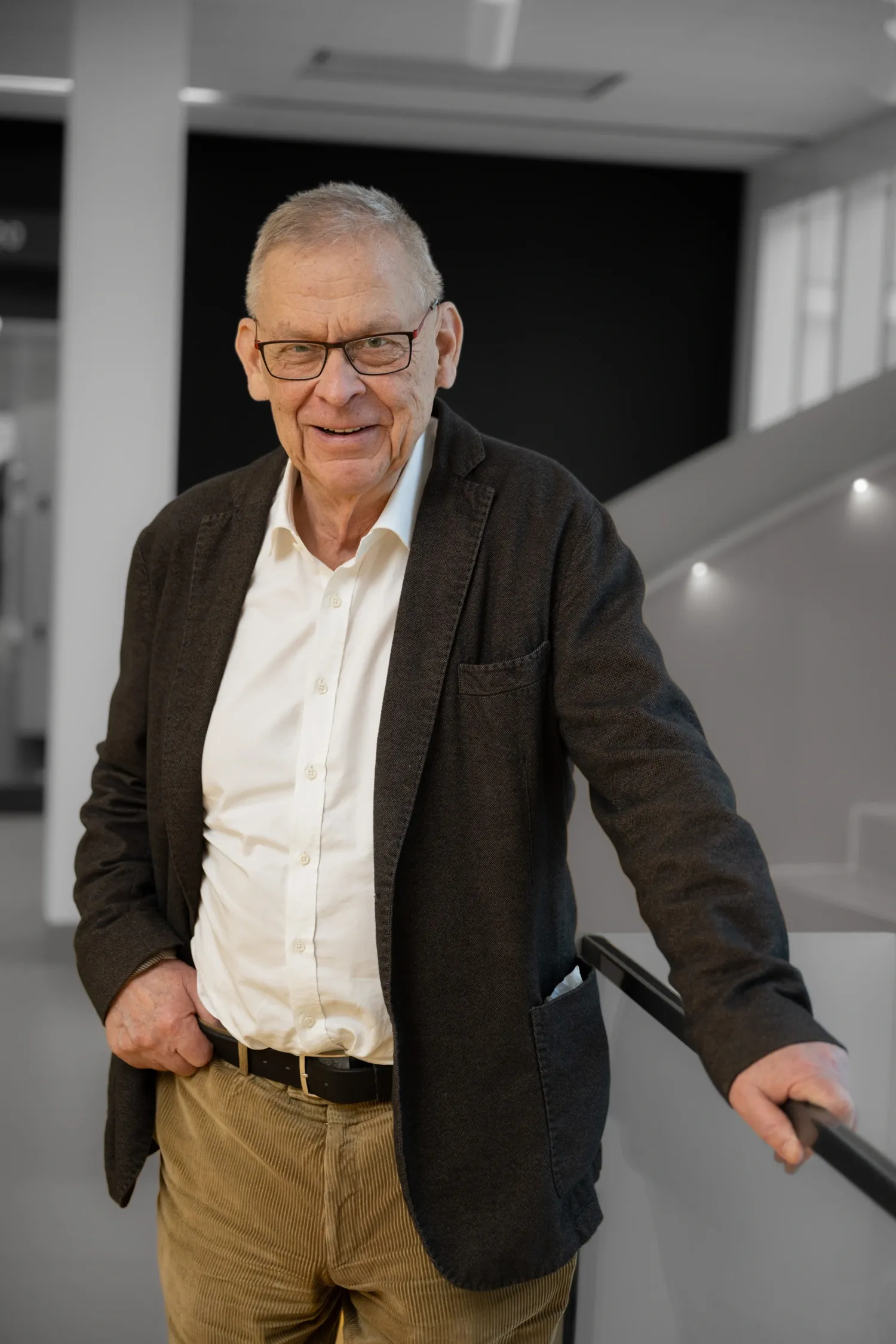 Porträtt av man i mörk kavaj.