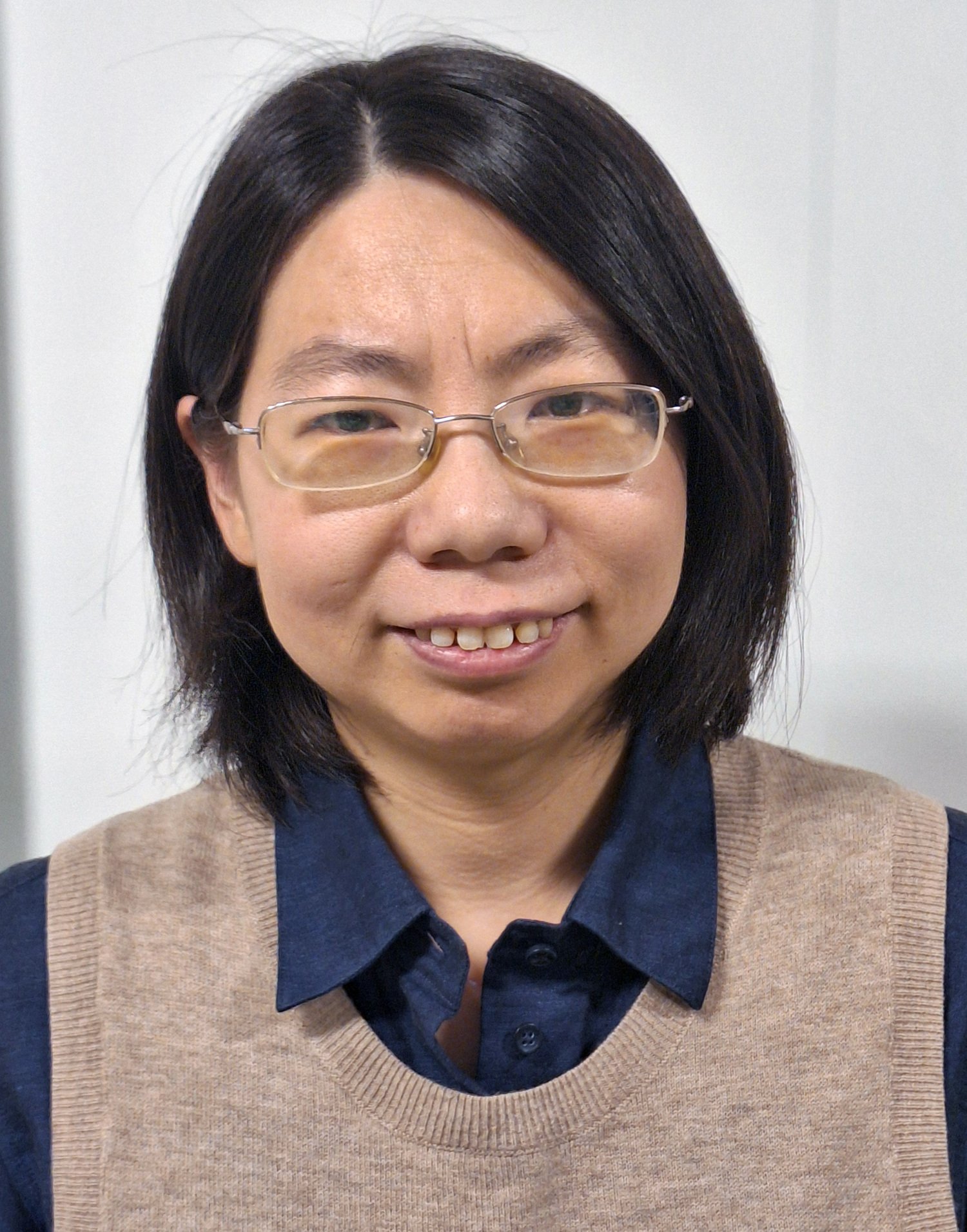 Porträttfoto av forskaren Yue Shi
