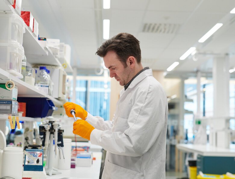 Photo of Gerald McInerney in the lab.