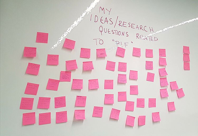 MMC workshop "Build program logic models" - post-it wall with research ideas and questions.