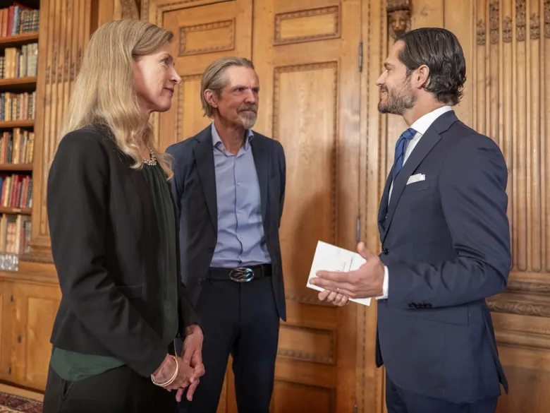 One woman and two men