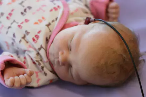 Allison Mackey&#039;s daughter Elise having her hearing screening.