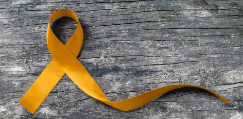 A golden ribbon against childhood cancers.