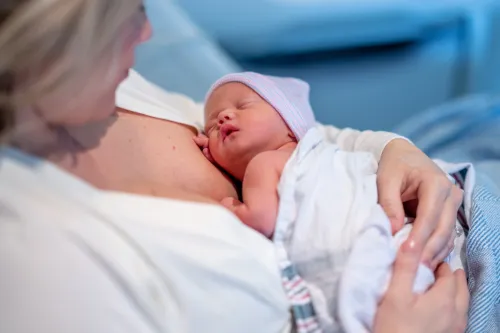 A mother with a newborn baby