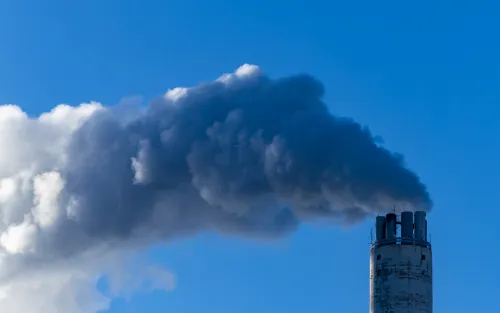 Stockholm, Sweden Steam coming out of a power plant smokestack on a cold day in winter.