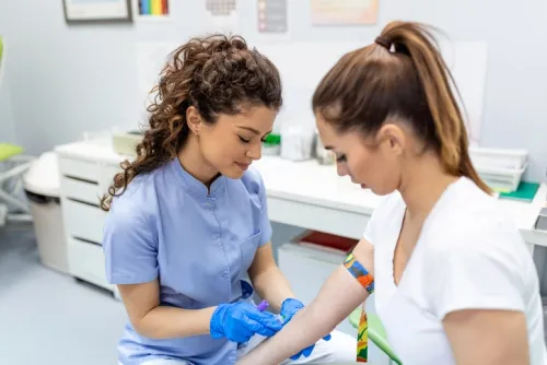 Young woman having a blood test