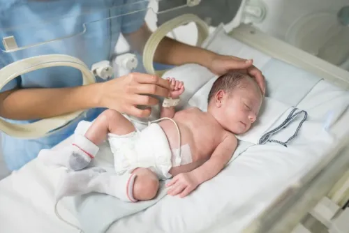 Newborn baby in an incubator