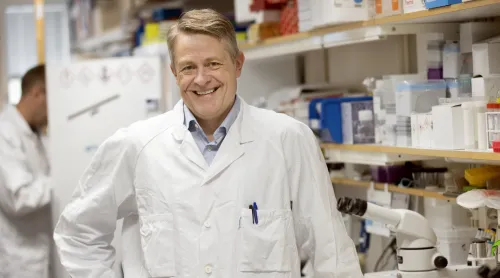 Portrait of Ola Nilsson in lab environment.