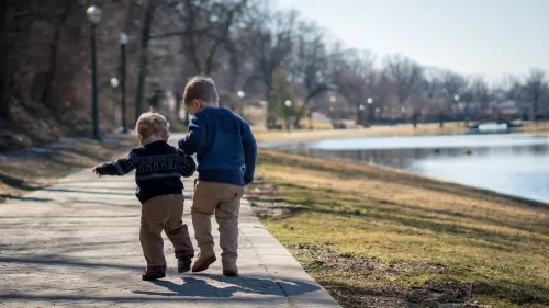 Two children, hand in hand