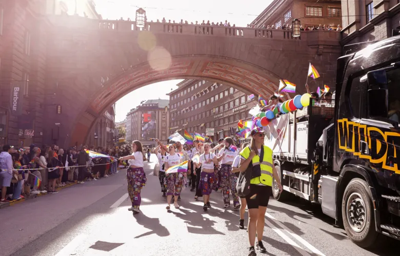 Students and staff participated in the Pride Parade 2022 waving flags through the streets of Stockholm.
